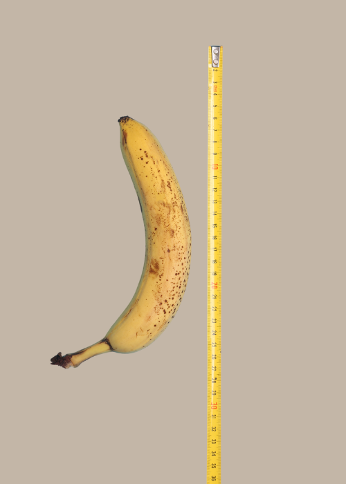 Banane mit Maßband zum Penisvergleich